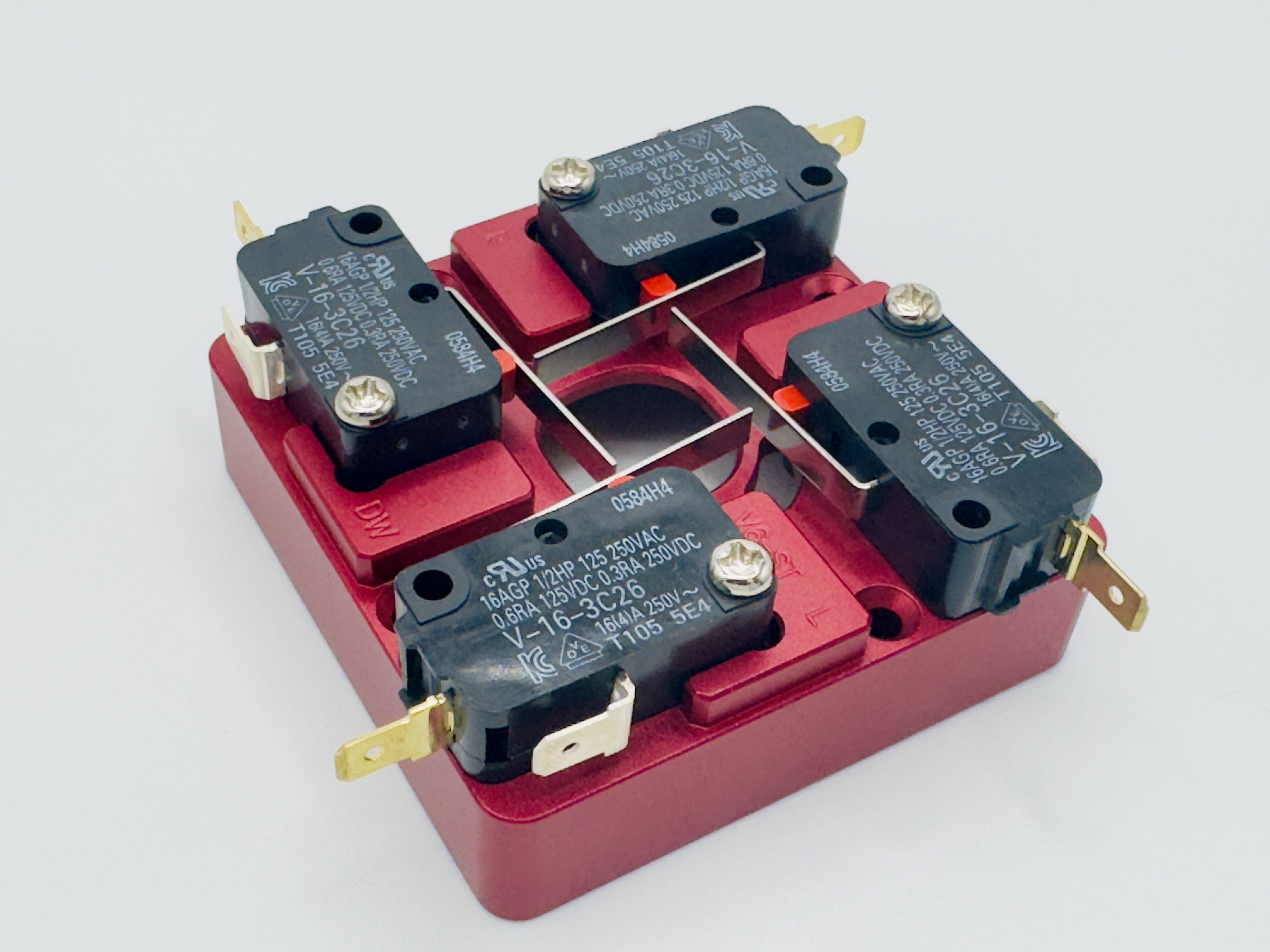 Four Omron V-16-3C26 switches on the V6-ST lower assembly